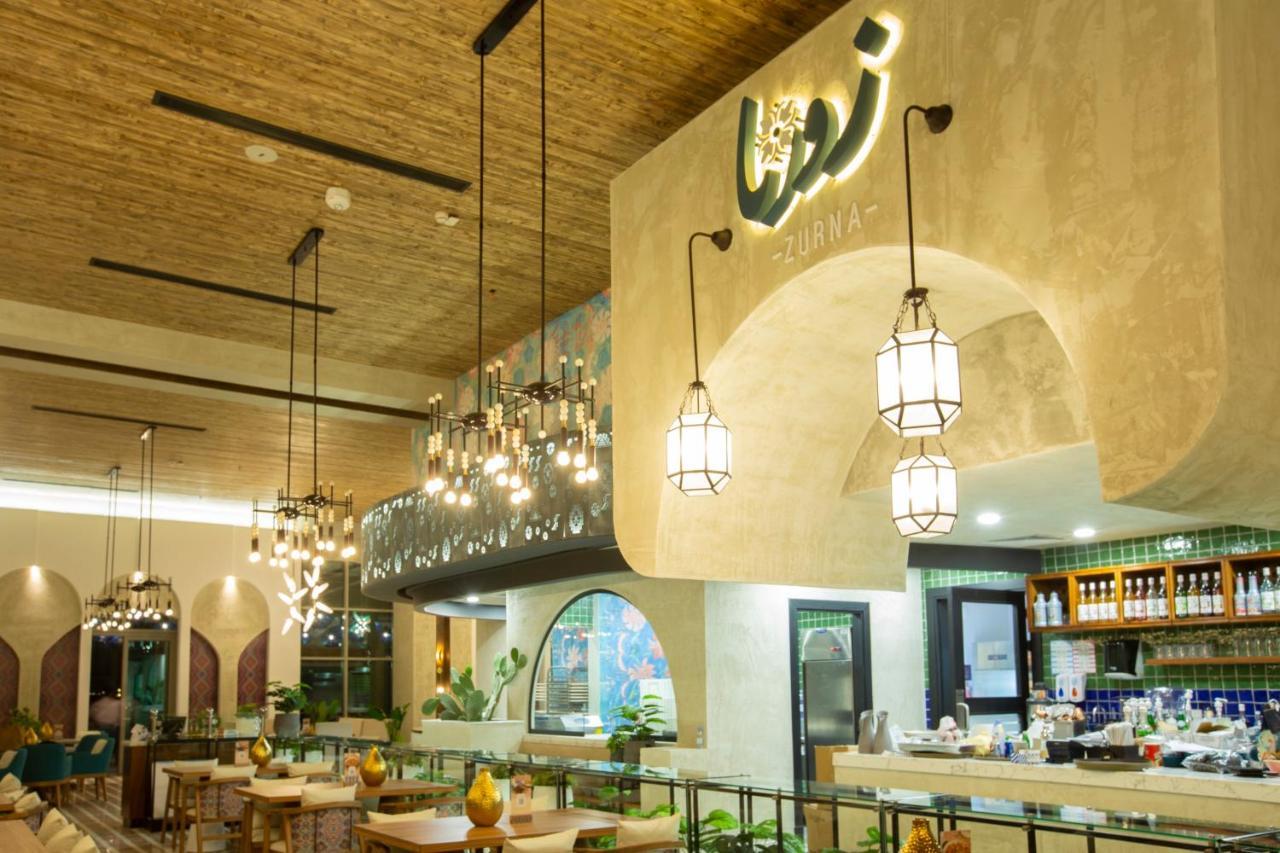 Citadines Abha Apart otel Dış mekan fotoğraf Interior of the restaurant