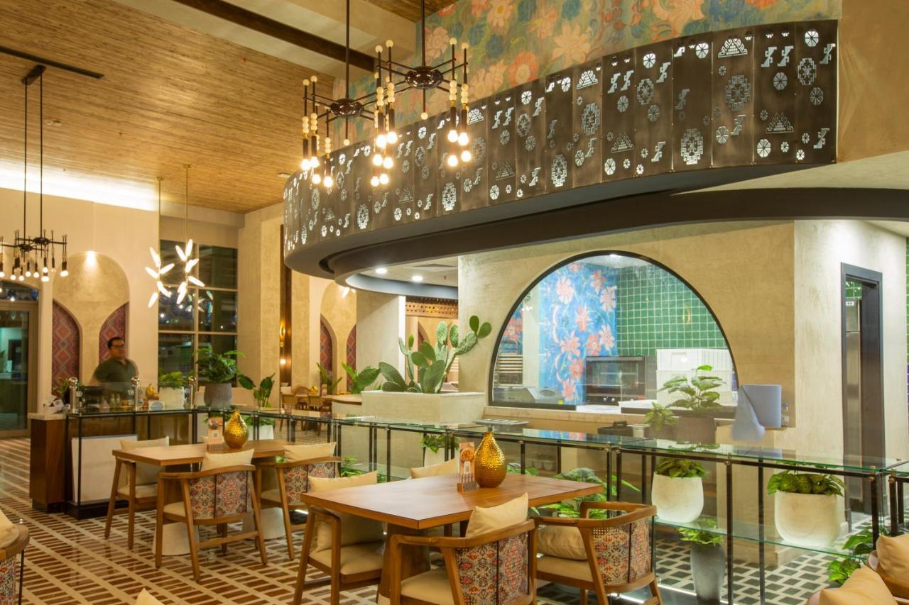 Citadines Abha Apart otel Dış mekan fotoğraf The interior of the restaurant